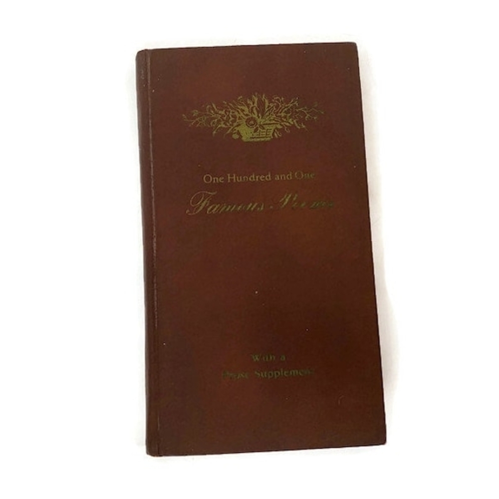 Brown Hardcover Book with Gold Text